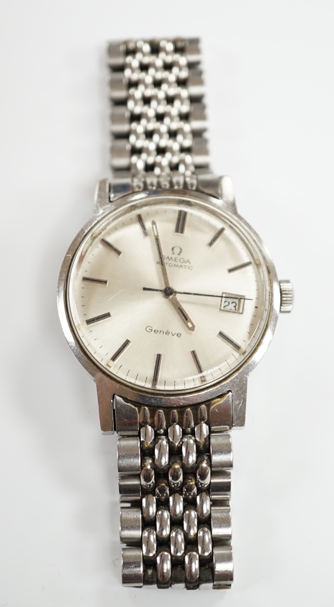 A gentleman's early 1970's stainless steel Omega automatic wrist watch, with date aperture, on a stainless steel Omega bracelet, with Omega box, no papers.